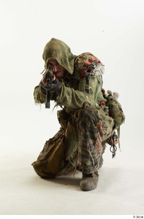 Photos John Hopkins Army Postapocalyptic Suit Poses aiming the gun…